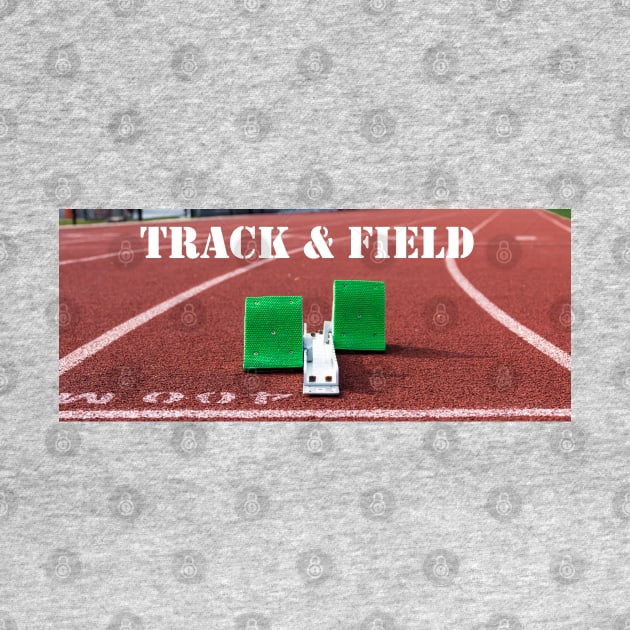 Track and field written above green starting blocks on a red track by Woodys Designs